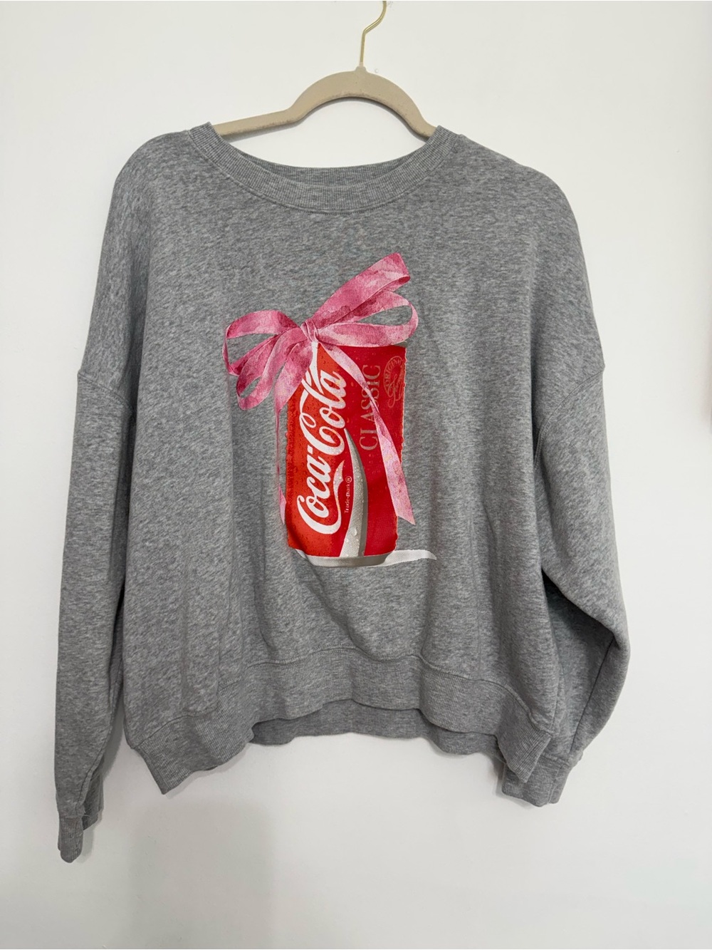 Coca-Cola Gray Crewneck Sweatshirt with Red Can and Pink Bow Graphic
